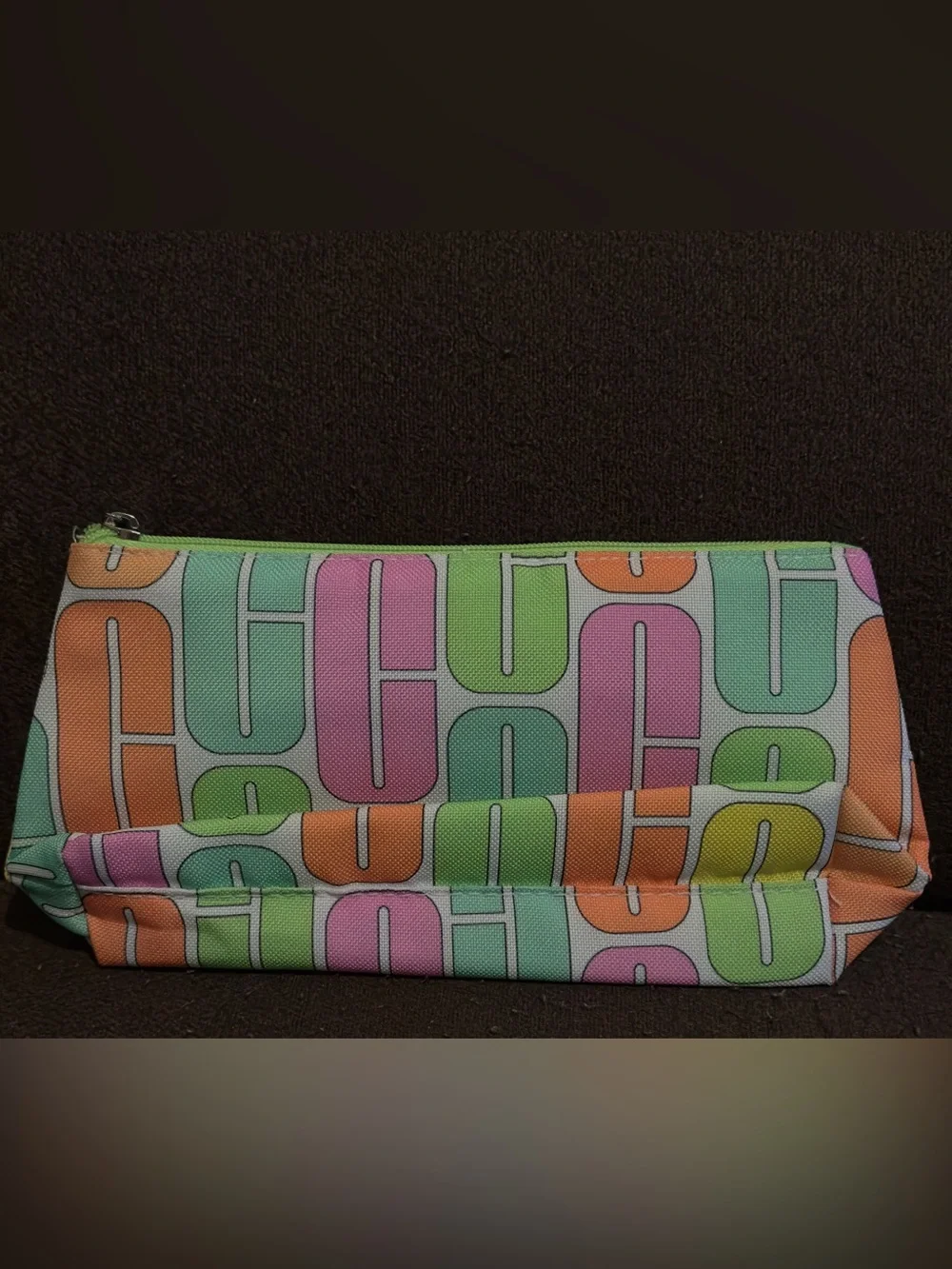 NWOT Clinique Pastel Geo Print Cosmetic Pouch - Multicolor. 9”W x 5”H.
